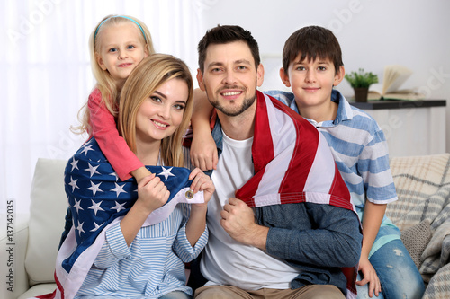 Happy parents wrapped in US...