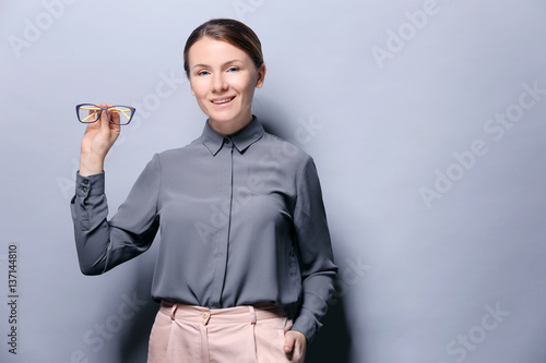 Young woman with spectacles...