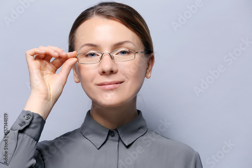 Young woman with spectacles...