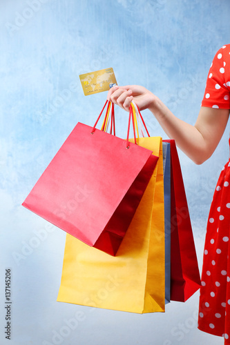 Woman holding shopping bags...