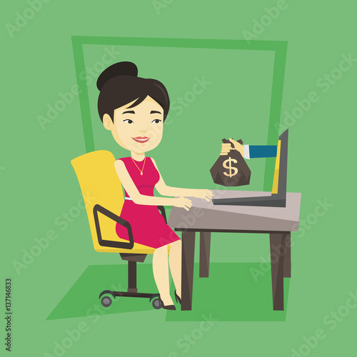 Businesswoman earning money from online business. photo