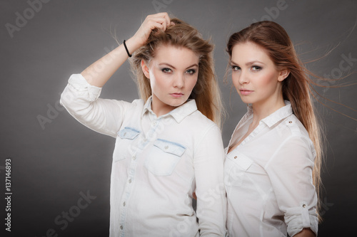 Two beautiful photomodels portrait. photo