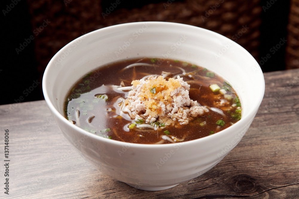 Delicious pork rice noodle made with fresh pork and vegetables Delicious pork rice noodle made with fresh pork and vegetables