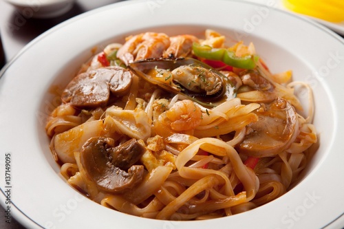 Delicious stir-fried rice noodles made from fresh mussels, shrimp, shellfish and seafood