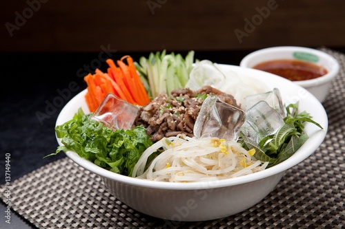 Tasty and spicy Bibim rice noodles made with fresh beef and vegetables