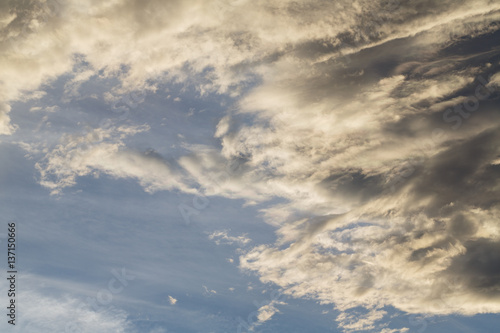 Cumulus clouds against a blue sky. Overcast. Weather forecast.