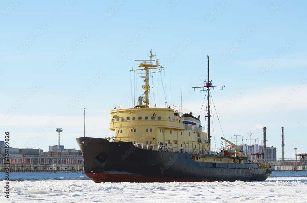 Fototapeta premium The powerful icebreaker breaks the ice.