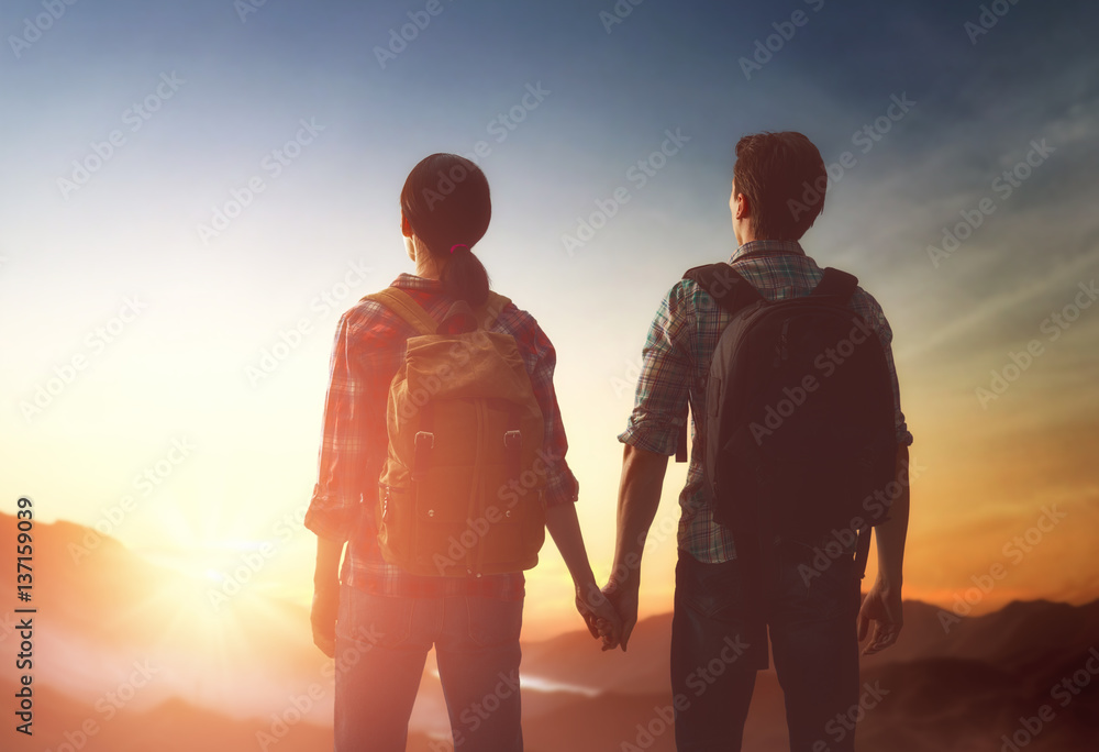 Couple looks at sunset