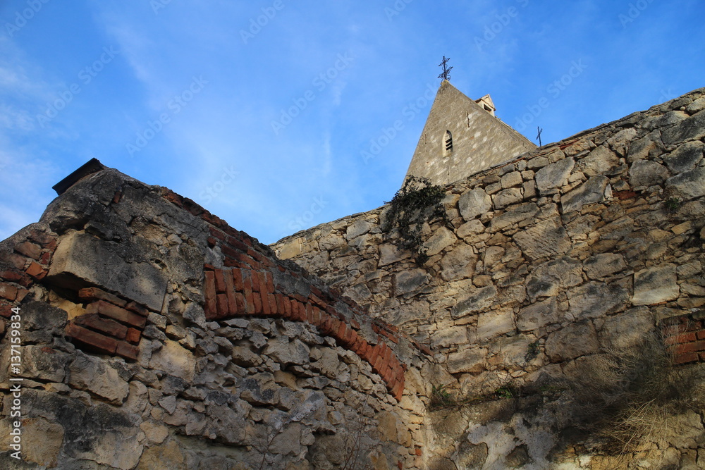 Stone wall with church in Rust Austria