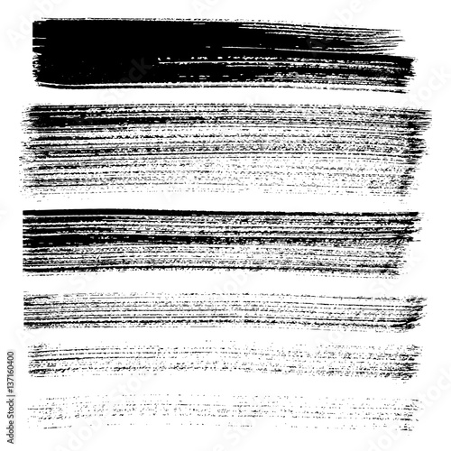 Set of different grunge brush strokes and stains.