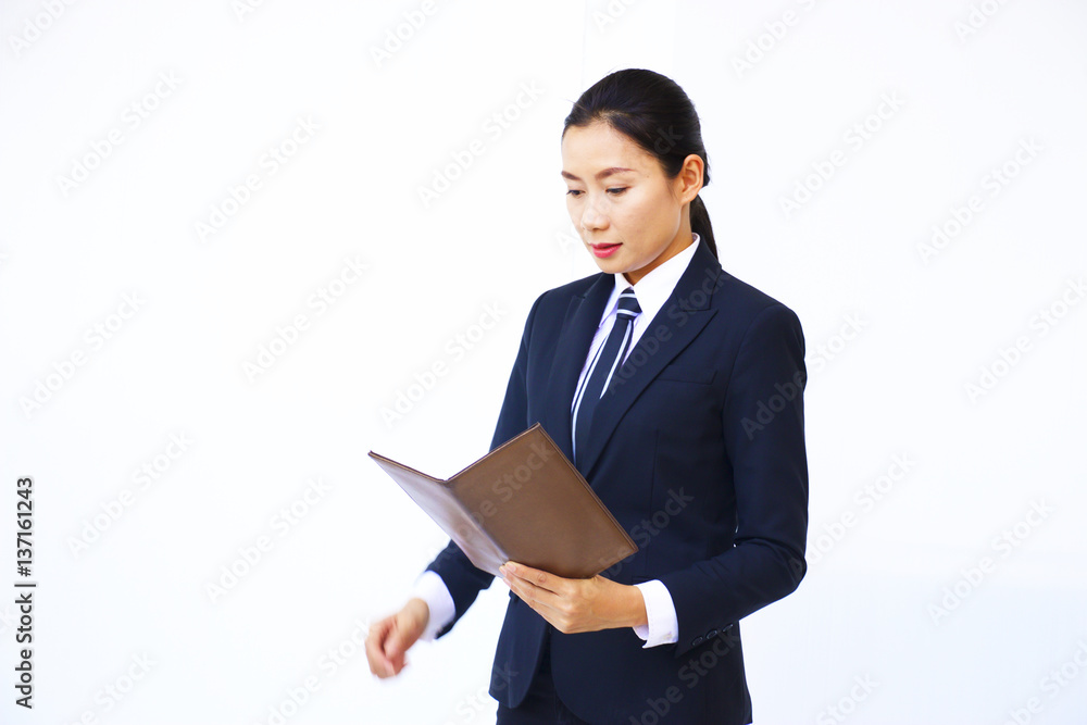 Business woman wears suit is on white background. Business woman wears suit is on white background.