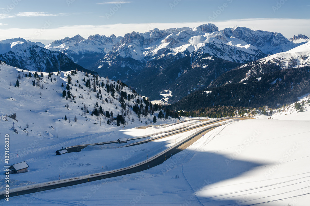 Sunny view of Dolomite Alps from viewpoint of Passo Pordoi near Canazei of Val di Fassa, Trentino-Alto-Adige region, Italy. Sunny view of Dolomite Alps from viewpoint of Passo Pordoi near Canazei of Val di Fassa, Trentino-Alto-Adige region, Italy.