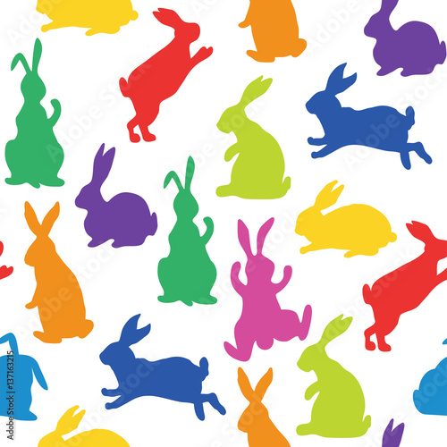 Seamless pattern with silhouettes of bunnies