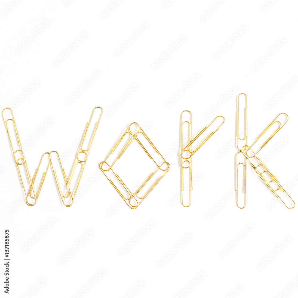 Word Work made of golden clips. Minimalistic flat lay, top view composition. Word Work made of golden clips. Minimalistic flat lay, top view composition.