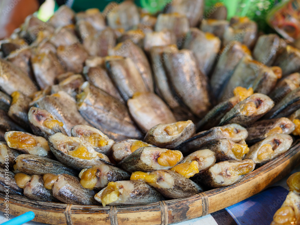 dried salted damsel fish with eggs put on threshing basket