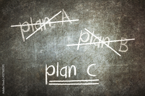 Crossing out Plan A and Plan B and writing Plan C