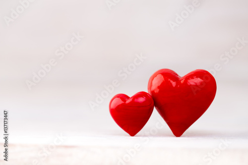 Red hearts the bokeh background. Valentine Day background.