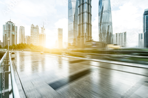 Photography elevated road in modern city with sunbeam