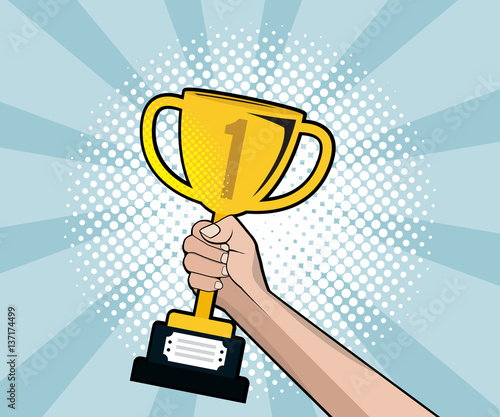 abstract hand holding gold trophy with half tone background