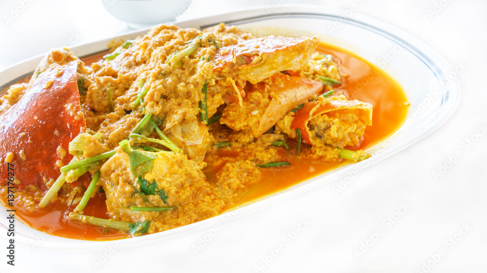 Delicious Thai stir-fried Crab with Curry Powder on plate Delicious Thai stir-fried Crab with Curry Powder on plate