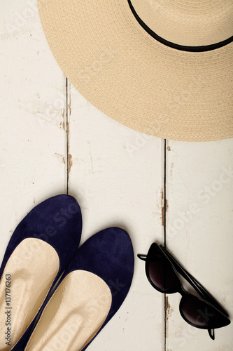 Summer fashion set. Women's hat, ballet flats and sunglasses.