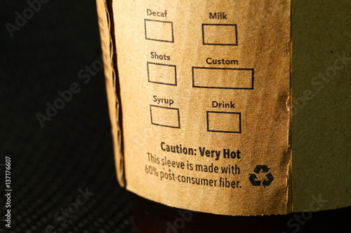 The coffee cup brown color paper label represent the coffee and cold beverage business concept related idea.