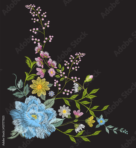 Embroidery colorful trend floral angle pattern. Vector traditional folk blue roses, chamomile, forget me not flowers bouquet on black background for clothing design.
