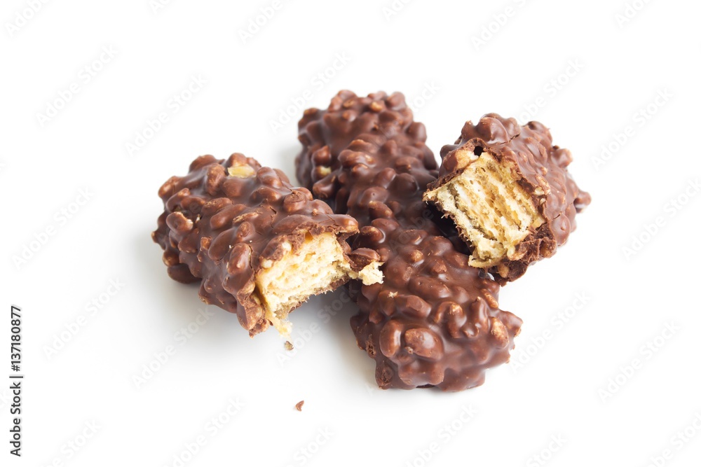 Obraz premium chocolate bar isolated on white / chocolate protein bar / Piece of chocolate candy isolated on white background