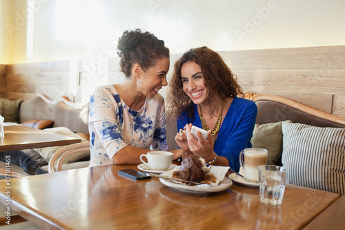 Women having fun at restaurant.