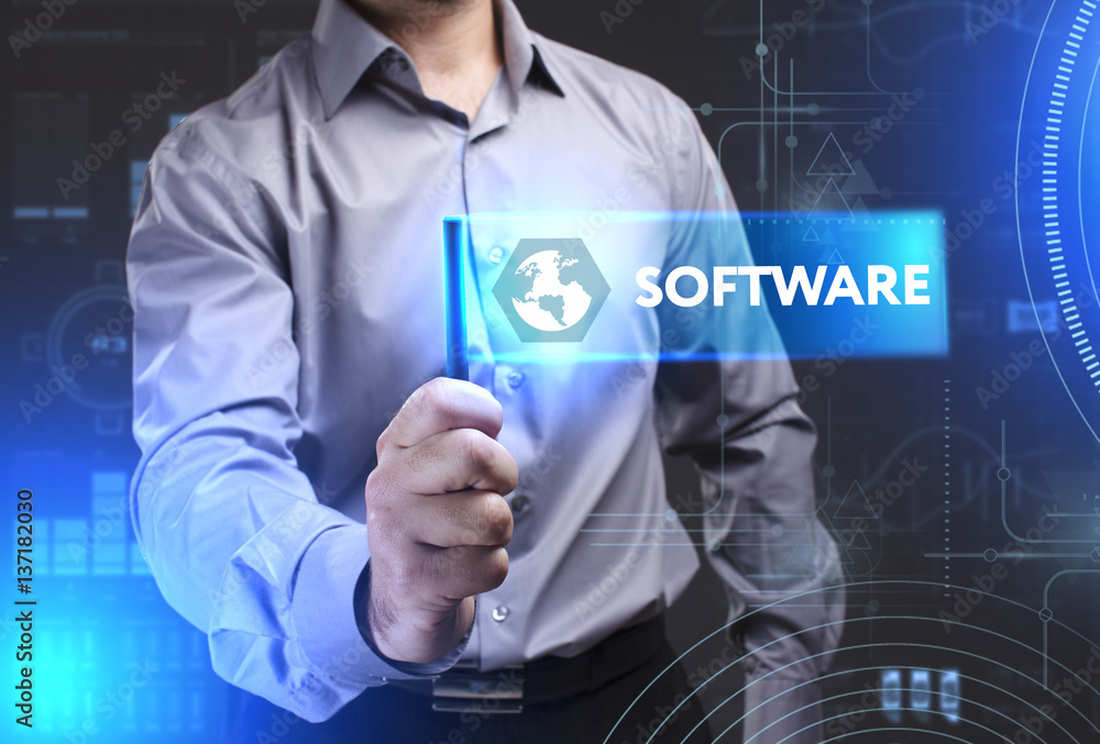 Business, Technology, Internet and network concept. Young businessman showing a word in a virtual tablet of the future: Software Business, Technology, Internet and network concept. Young businessman showing a word in a virtual tablet of the future: Software