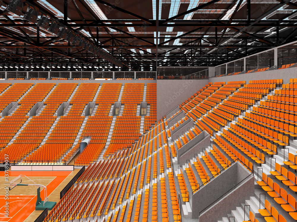 Beautiful sports arena for basketball with orange seats and VIP boxes