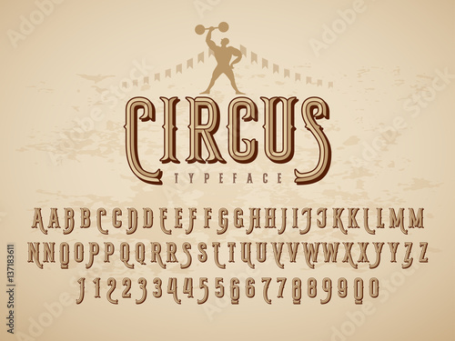Decorative vintage circus typeface on grunge texture background photo