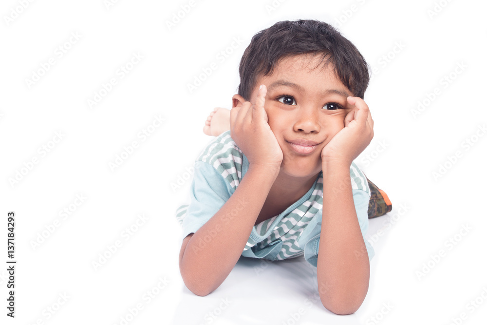 Asian boy sad lying on floor white background Asian boy sad lying on floor white background