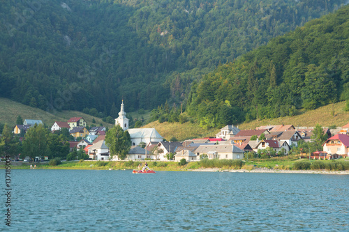 small village with lake and forest