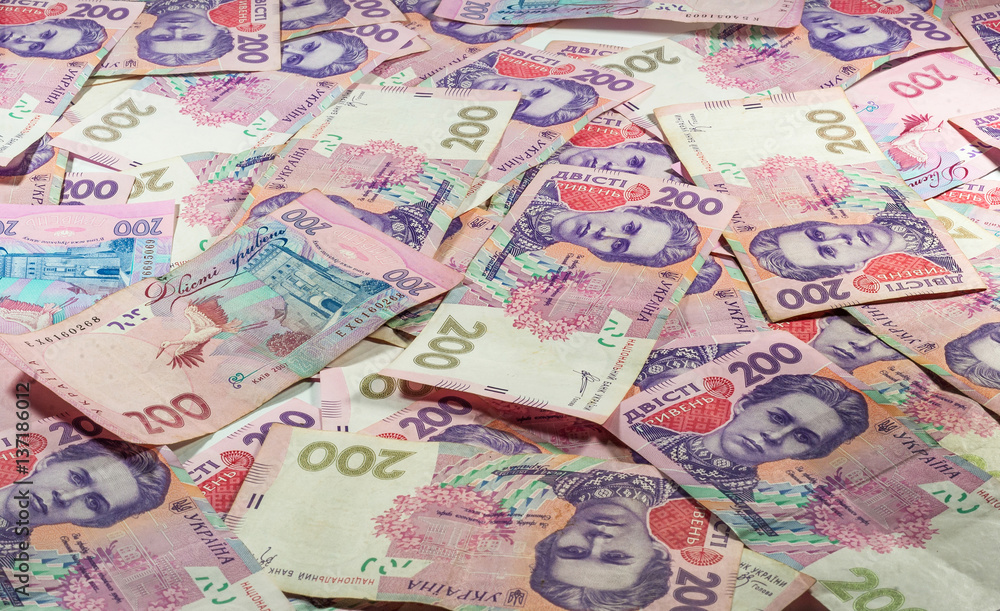 Fototapeta premium Ukrainian money hryvnia. The national currency. Pile of bancknotes