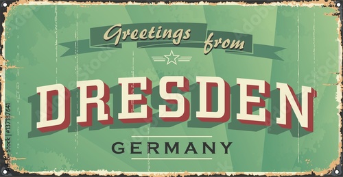 Vintage tin sign with German city. Dresden. Germany. City vintage poster vector. Layered vector no effect. Retro souvenirs or postcard templates on rust background.