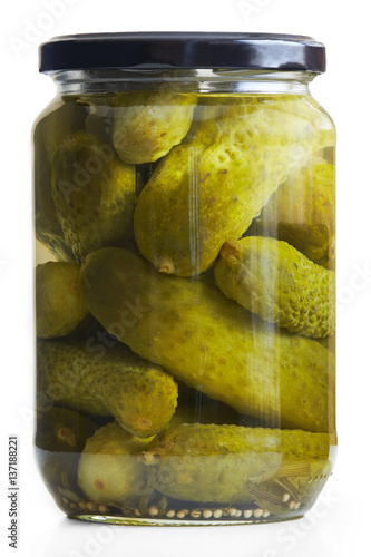 Jar of pickled cucumbers isolated on white background
