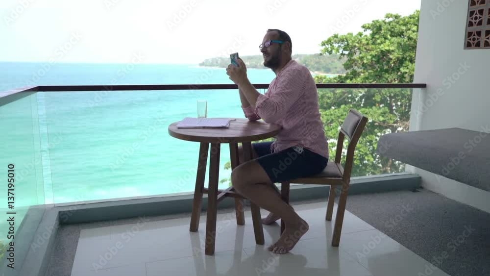 custom made wallpaper toronto digitalYoung man taking selfie photo with cellphone sitting on terrace