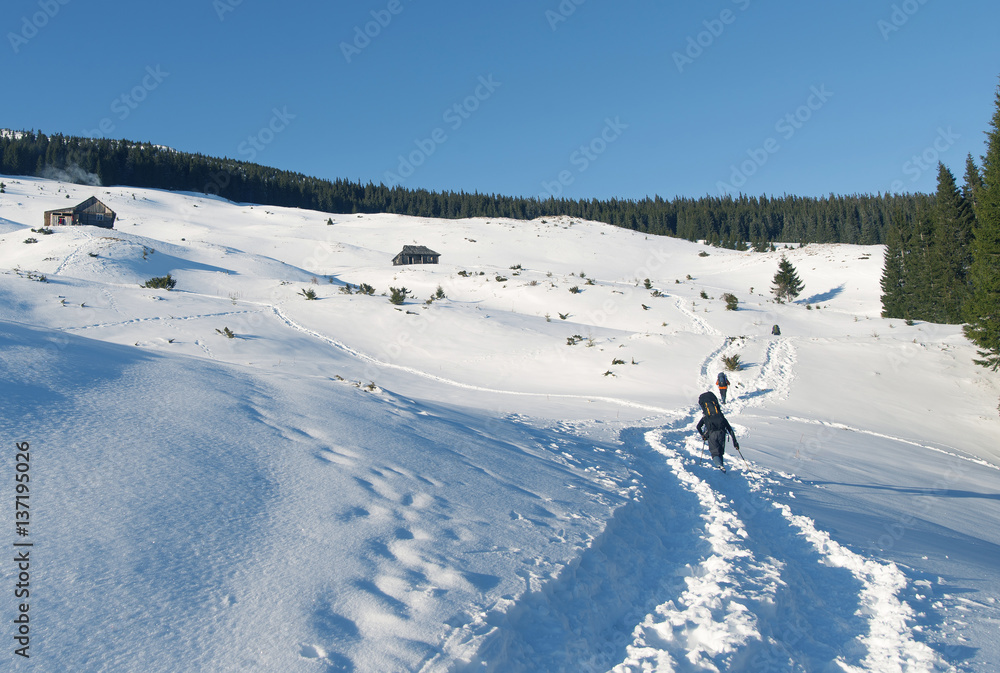 tourist with a backpack snowy mountains tourist with a backpack snowy mountains