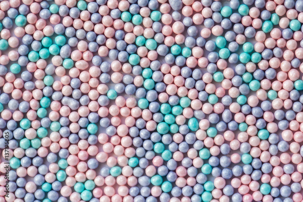 Sugar sprinkle dots, decoration for confectionery. High magnification macro. Sugar sprinkle dots, decoration for confectionery. High magnification macro.