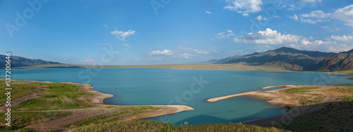 Bartogai dam on a mountain river Chilik, Kazakhstan upcast of water © Oleg