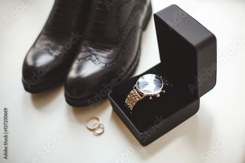 Watches, shoes, wedding rings. Wedding day.