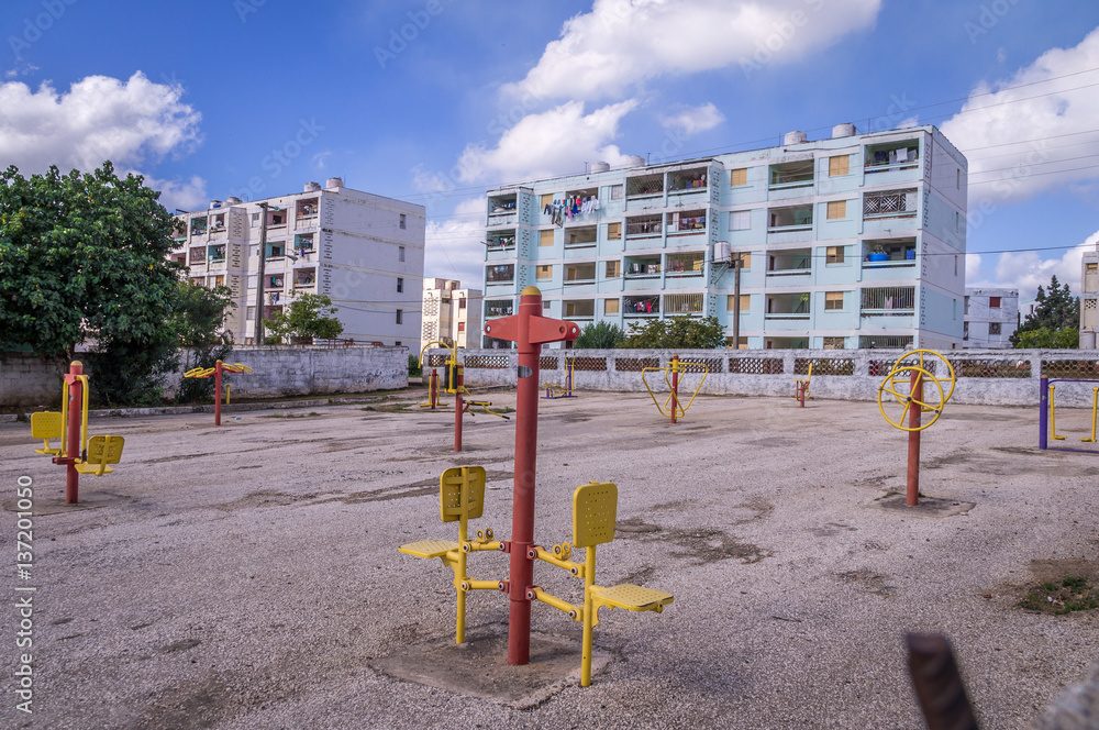 The real Cuba: Emty playground and apartment blocks in residential area in Trinidad, Cuba