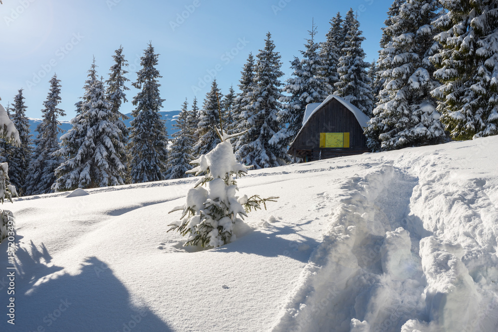Log cabin, shelter in the winter mountains Log cabin, shelter in the winter mountains