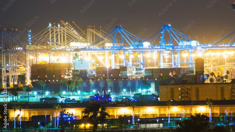 Timelapse of Cranes Loading Container Ship at Port of LA at Night -Long Crop- Timelapse of Cranes Loading Container Ship at Port of LA at Night -Long Crop-