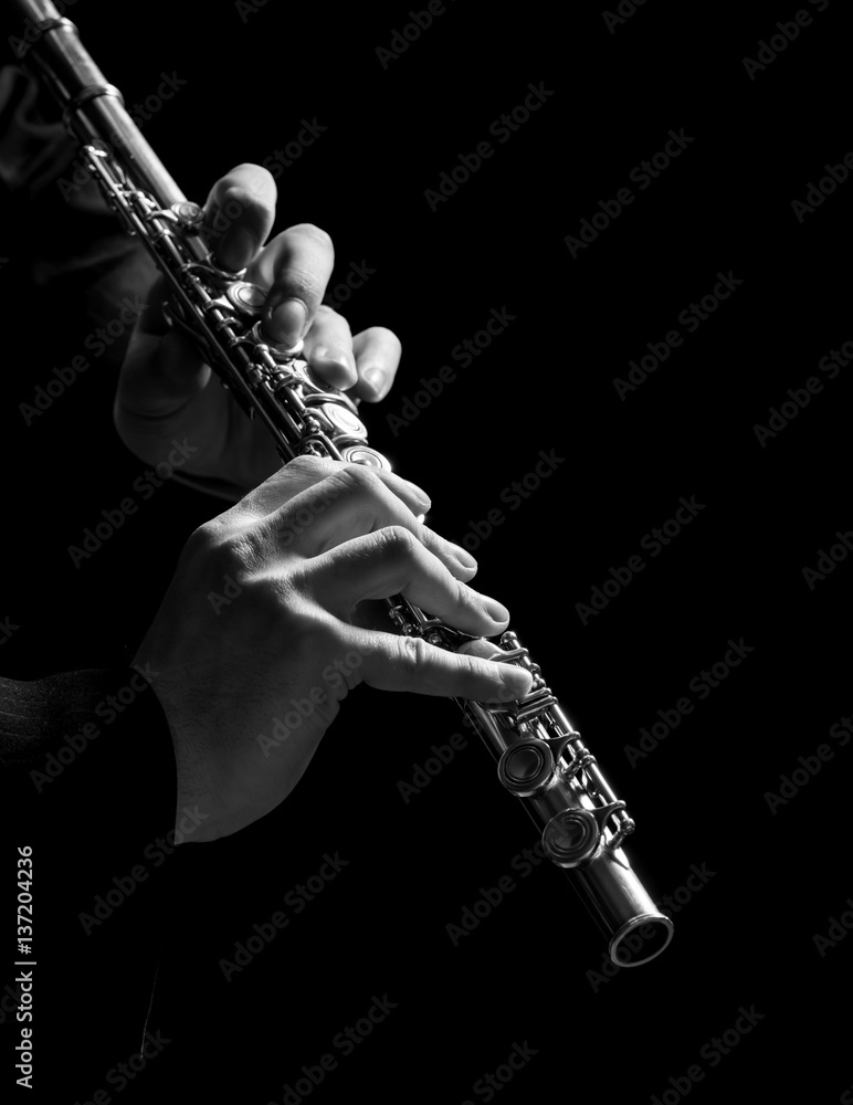Flute in hands - music background Stock Photo | Adobe Stock