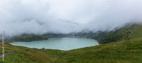 thick white mist over the Big Almaty Lake