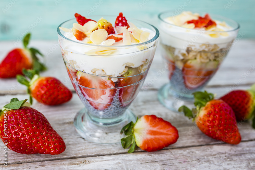 Strawberries and chia seeds grains quinoa and yoghurt. Healthy and delicious super diet. Strawberries and chia seeds grains quinoa and yoghurt. Healthy and delicious super diet.