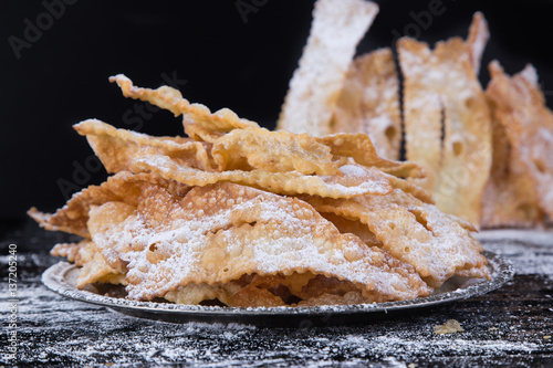 Obraz na płótnie carnival sweets with powdered sugar for fat Tuesday w salonie