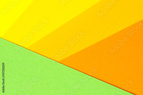 background of colored paper geometric shapes